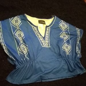A blue and white half shirt